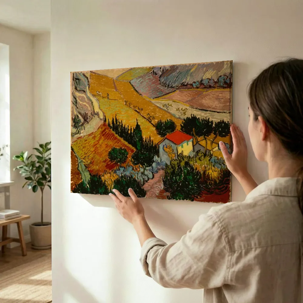 Sfeerimpressie: Landschap met een huis en een ploeger in vogelvlucht gezien van Vincent van Gogh terwijl het wordt opgehangen