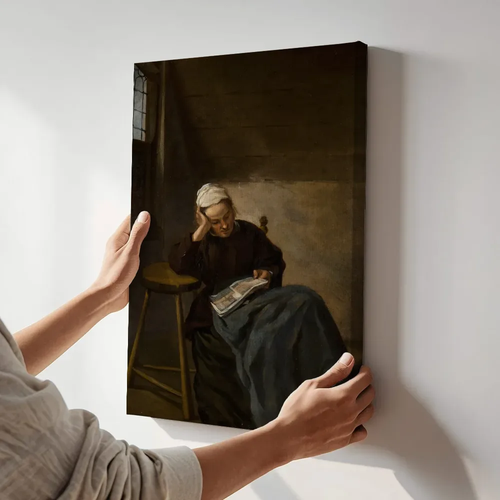 Sfeerimpressie: Lezend meisje van Nicolaes Hals terwijl het aan de muur wordt gehangen
