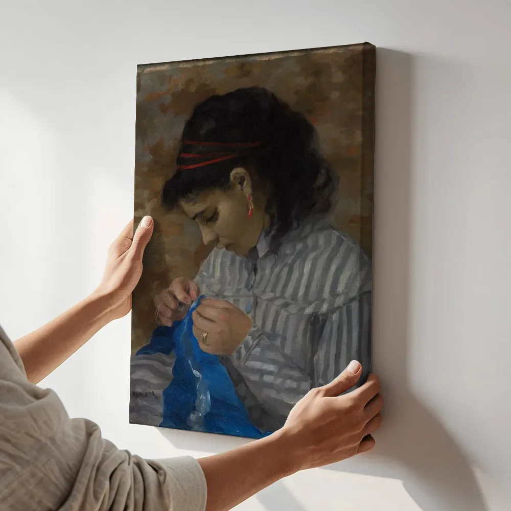 Sfeerimpressie: Lise Sewing van Pierre-Auguste Renoir terwijl het aan de muur wordt gehangen