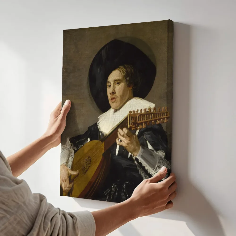 Sfeerimpressie: Luitspeler van Judith Leyster terwijl het aan de muur wordt gehangen