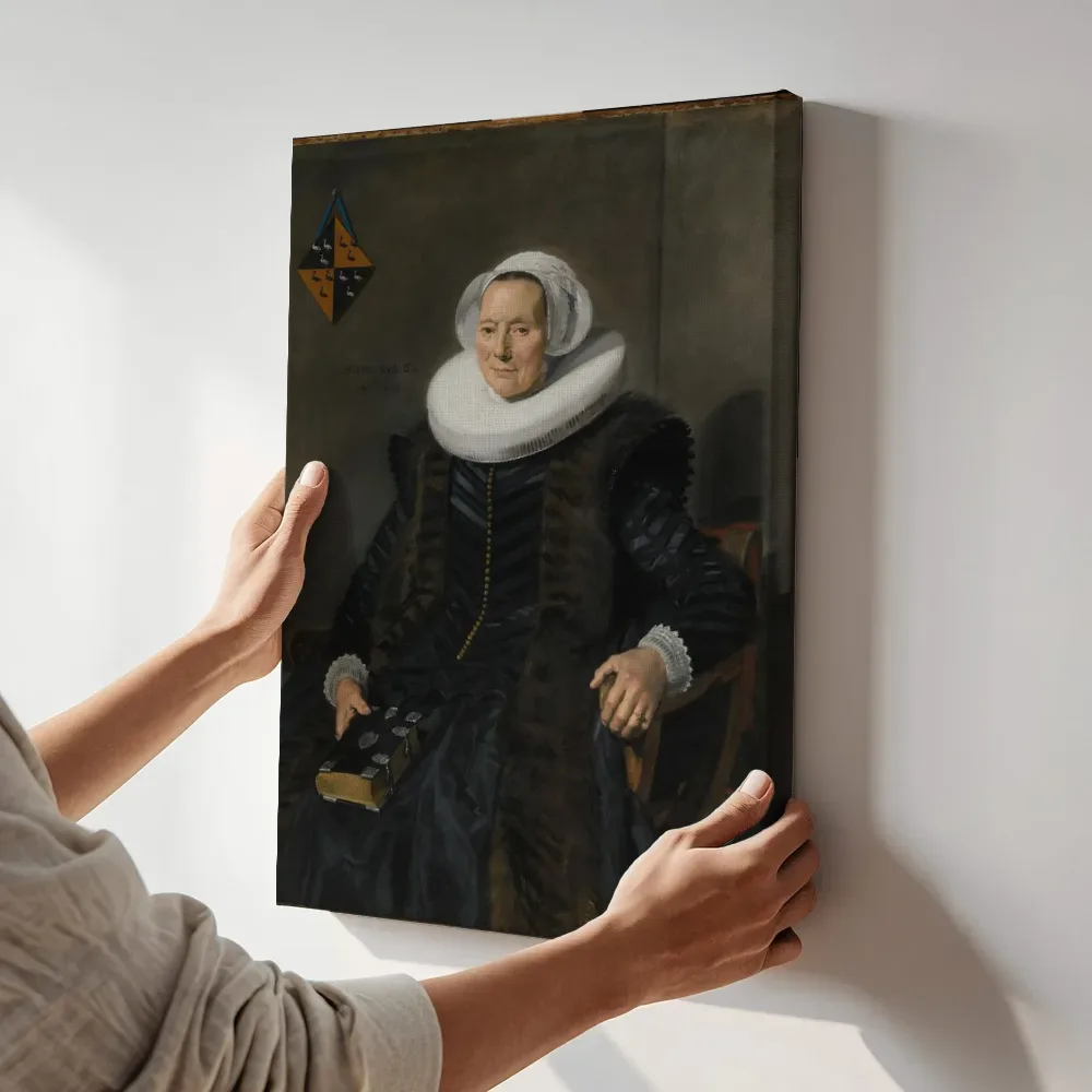 Sfeerimpressie: Maritge Voogt Claesdr (1577 1644). Echtgenote van Pieter Jacobsz Olycan, burgemeester van Haarlem van Frans Hals terwijl het aan de muur wordt gehangen