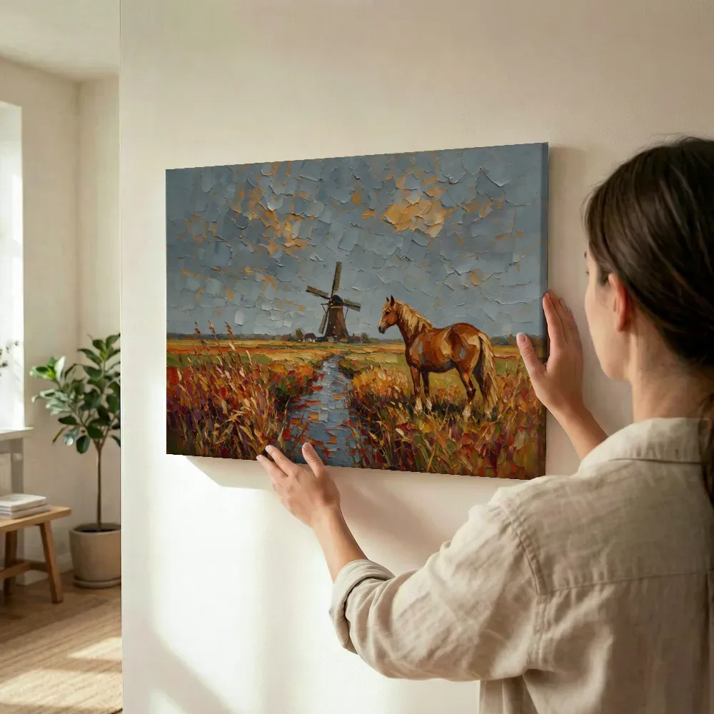 Sfeerimpressie: Molen warm in het volle beeld tussen de grassen terwijl het omhoog wordt gehouden