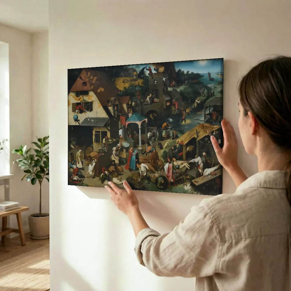 Sfeerimpressie: Nederlandse spreekwoorden van Pieter Bruegel de Oude terwijl het wordt opgehangen