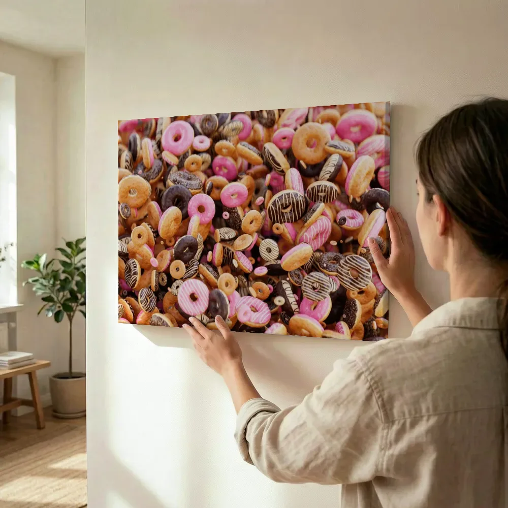 Sfeerimpressie: Overvloed aan donuts van bovenaf terwijl het wordt opgehangen