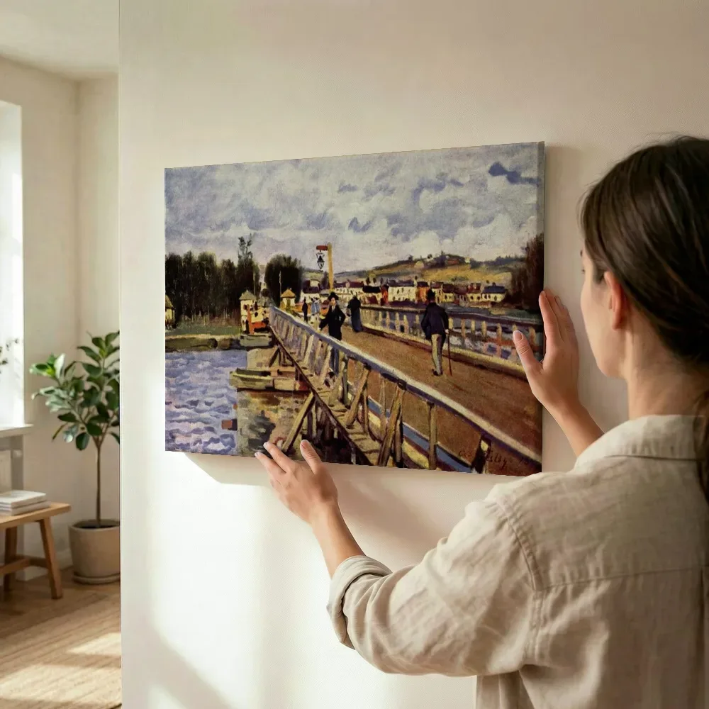 Sfeerimpressie: Passerelle d'Argenteuil van Alfred Sisley terwijl het wordt opgehangen