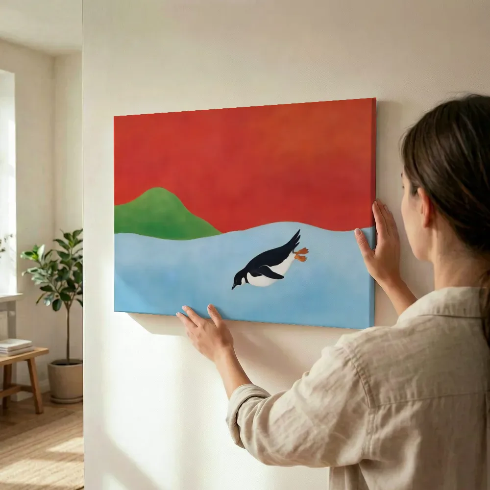 Sfeerimpressie: Pinguïn in hemelblauw en klaproosrood terwijl het wordt opgehangen