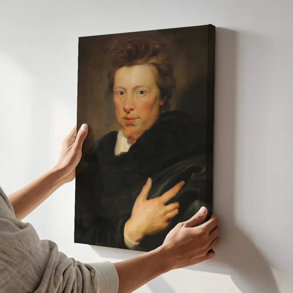 Sfeerimpressie: Portret van Daniel Nijs van Peter Paul Rubens terwijl het aan de muur wordt gehangen