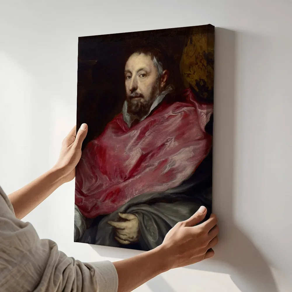 Sfeerimpressie: Portret van Anton Triest, bisschop van Gent (1577-1657) van Anthony van Dyck terwijl het aan de muur wordt gehangen
