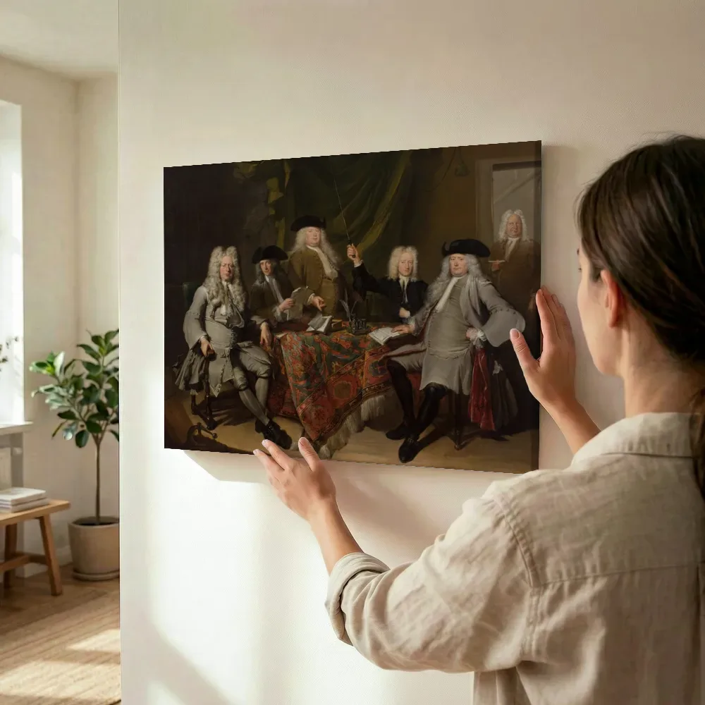 Sfeerimpressie: Portret van de inspecteurs van het Collegium Medicum van Cornelis Troost terwijl het wordt opgehangen