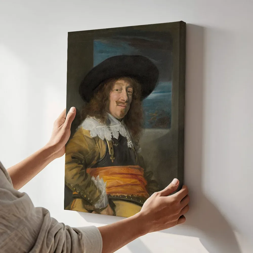 Sfeerimpressie: Portret van een cavalier van Frans Hals terwijl het aan de muur wordt gehangen