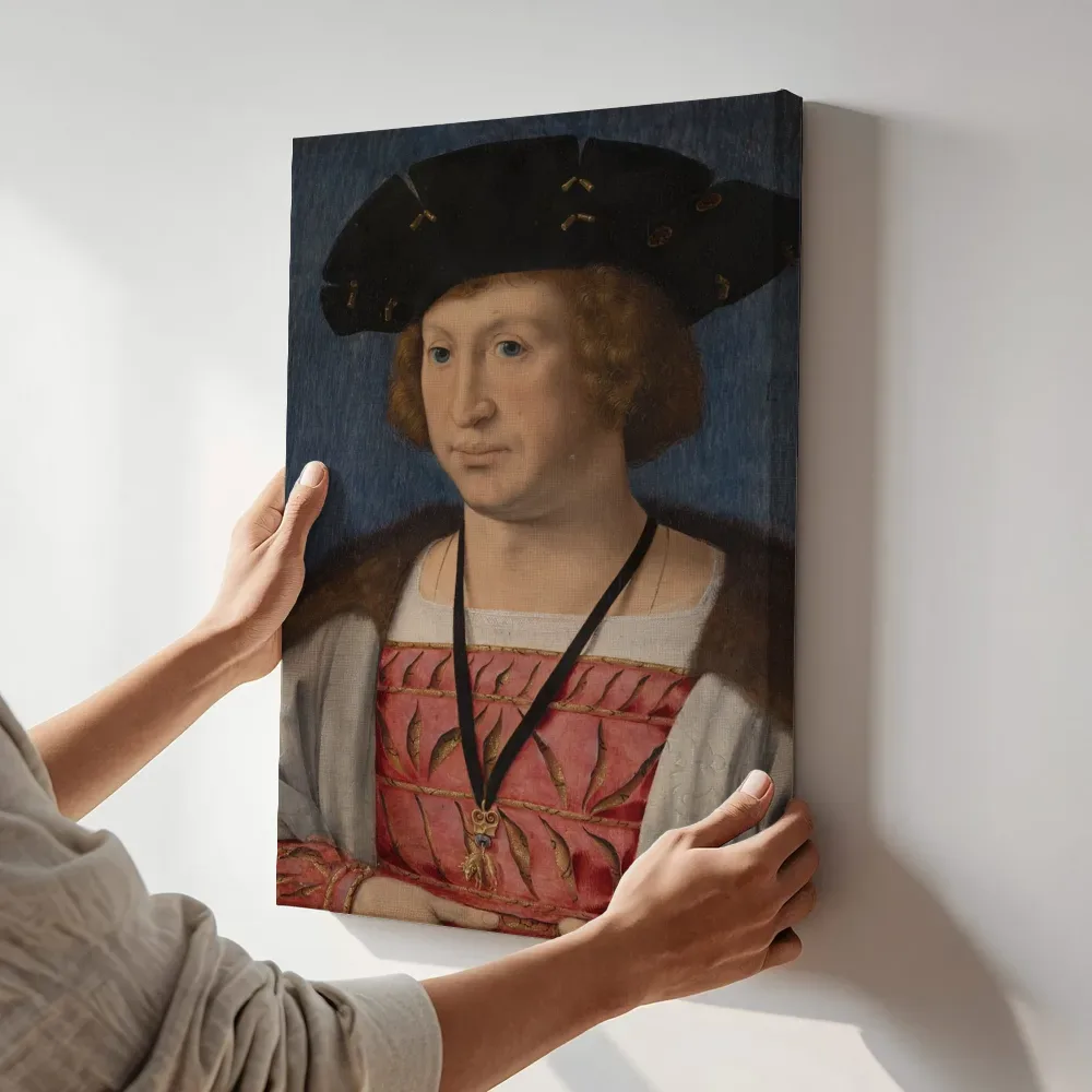 Sfeerimpressie: Portret van Floris van Egmond (1469-1539), graaf van Buren en Leerdam van Jan Gossaert terwijl het aan de muur wordt gehangen