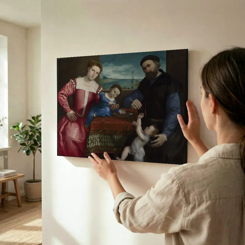 Sfeerimpressie: Portret van Giovanni della Volta met zijn vrouw en kinderen van Lorenzo Lotto terwijl het wordt opgehangen