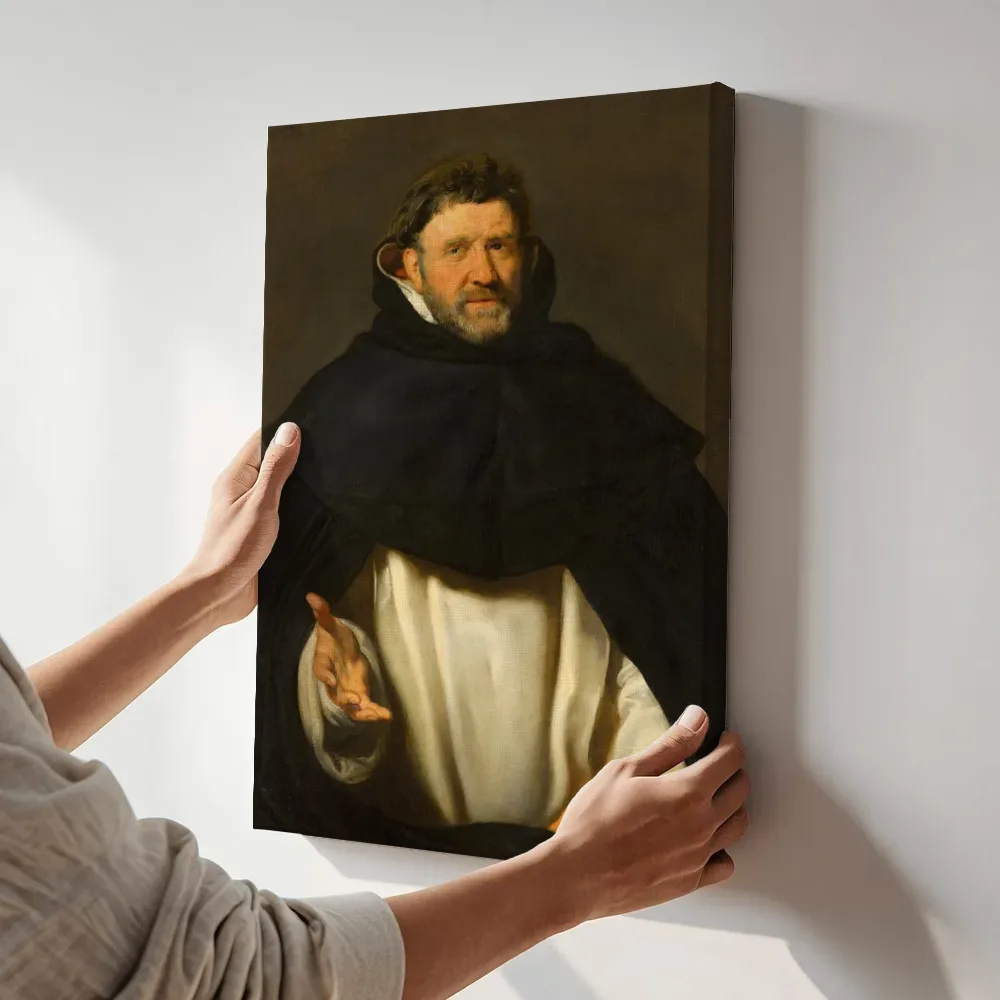 Sfeerimpressie: Portret van Michiel Ophovius (1570-1637), bisschop van 's-Hertogenbosch van Peter Paul Rubens terwijl het aan de muur wordt gehangen