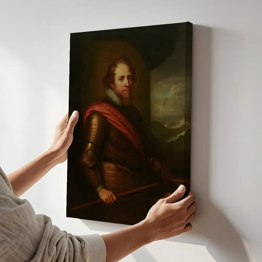 Sfeerimpressie: Portret van stadhouder Maurits (1567-1625), prins van Oranje, Naar Michiel Jansz. van Mierevelt terwijl het aan de muur wordt gehangen
