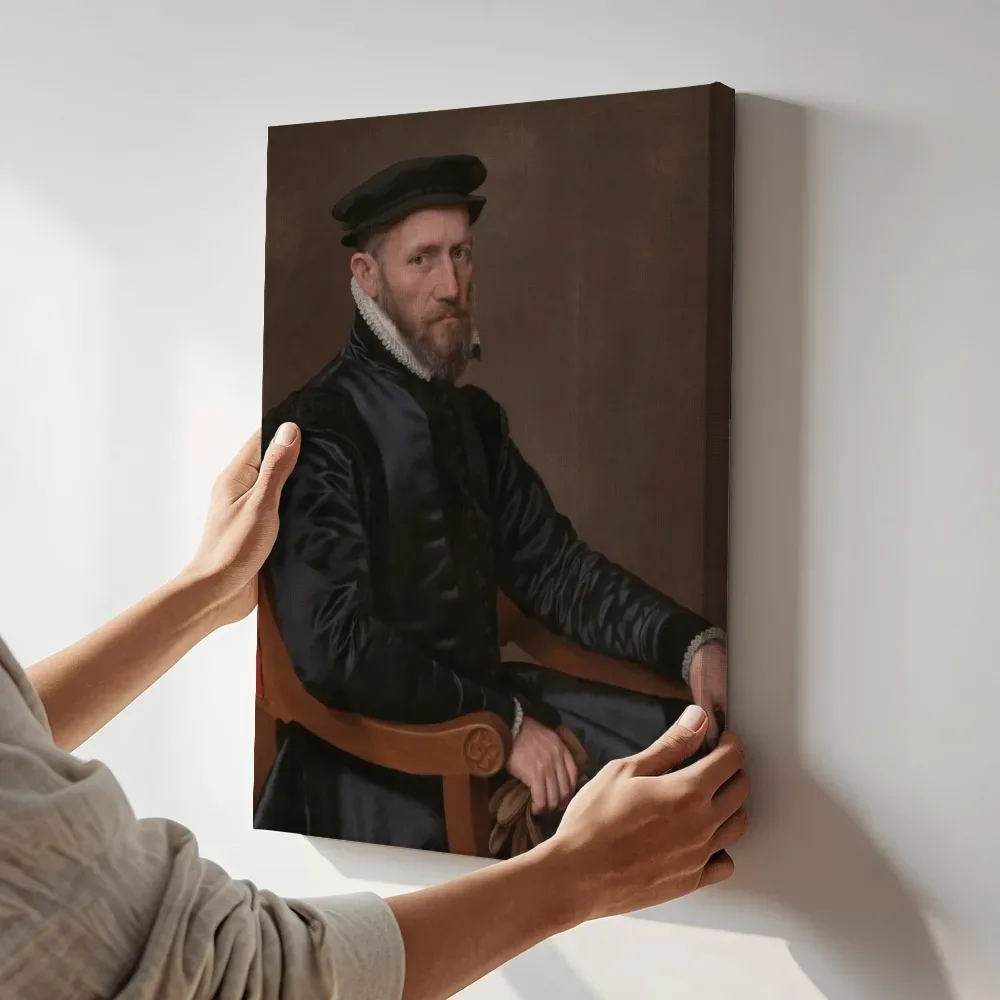 Sfeerimpressie: Portretten van Sir Thomas Gresham en Anne Fernely van Anthonis Mor terwijl het aan de muur wordt gehangen