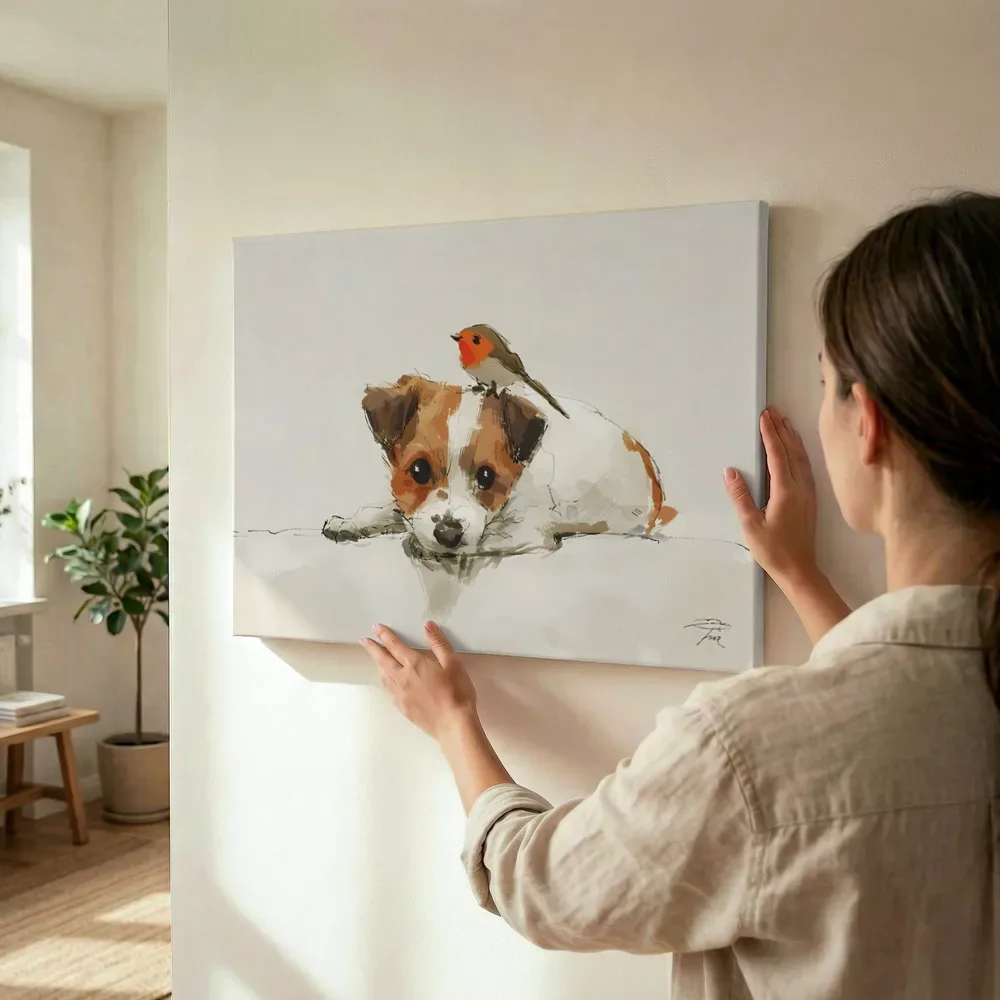 Sfeerimpressie: Puppy met roodborstje terwijl het wordt opgehangen