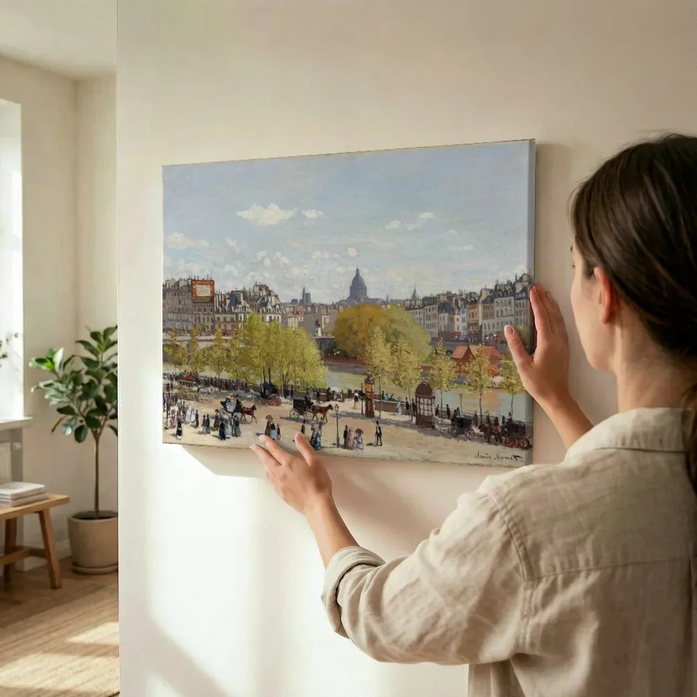 Sfeerimpressie: Quai du Louvre van Claude Monet terwijl het wordt opgehangen
