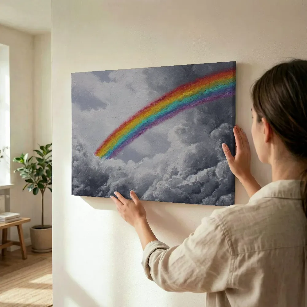 Sfeerimpressie: Regenboog in een zwart-wit wolkendek terwijl het wordt opgehangen