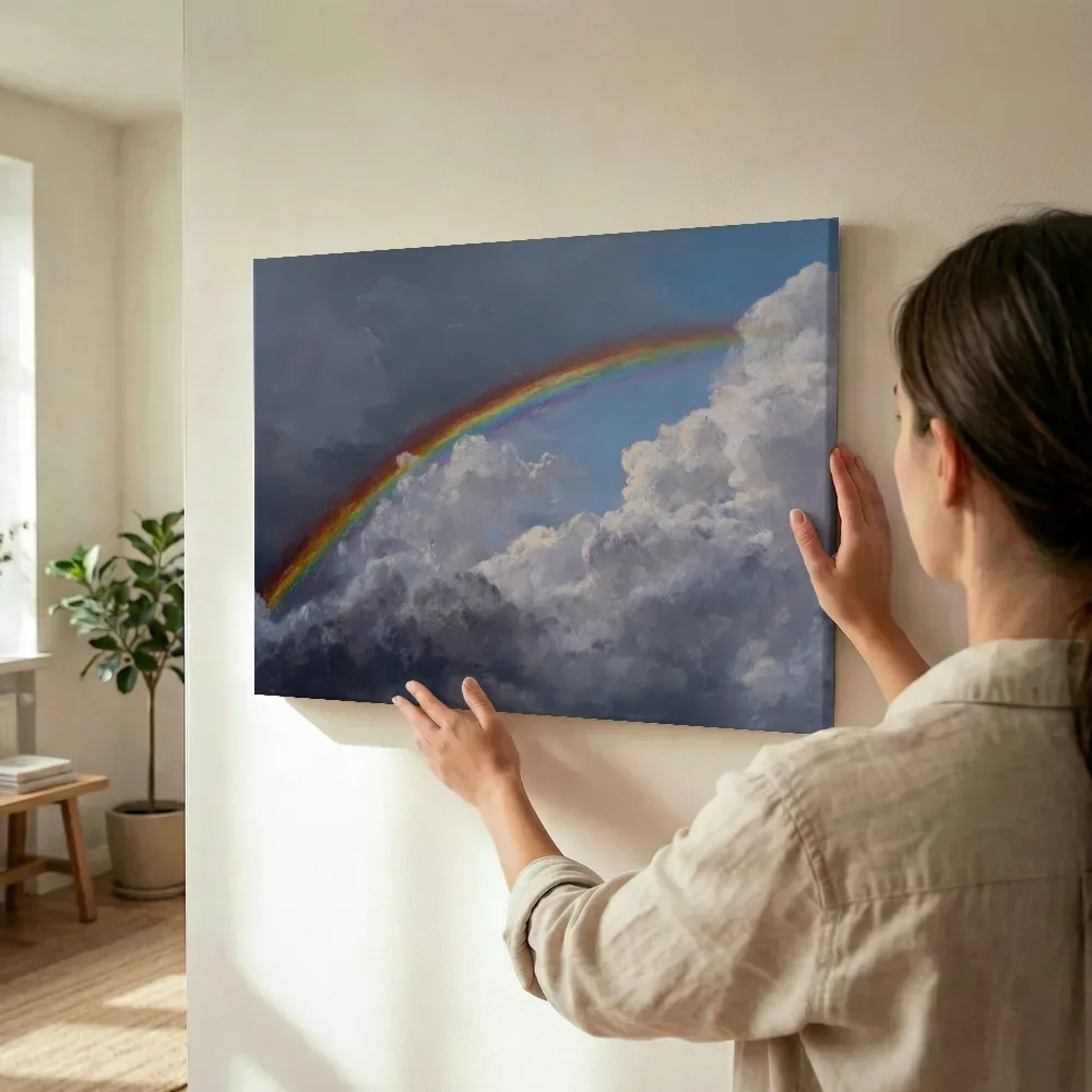 Sfeerimpressie: Regenboog met blauwe luchtopening terwijl het wordt opgehangen