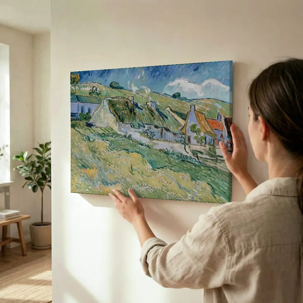 Sfeerimpressie: Rieten daken en huizen van Vincent van Gogh terwijl het wordt opgehangen