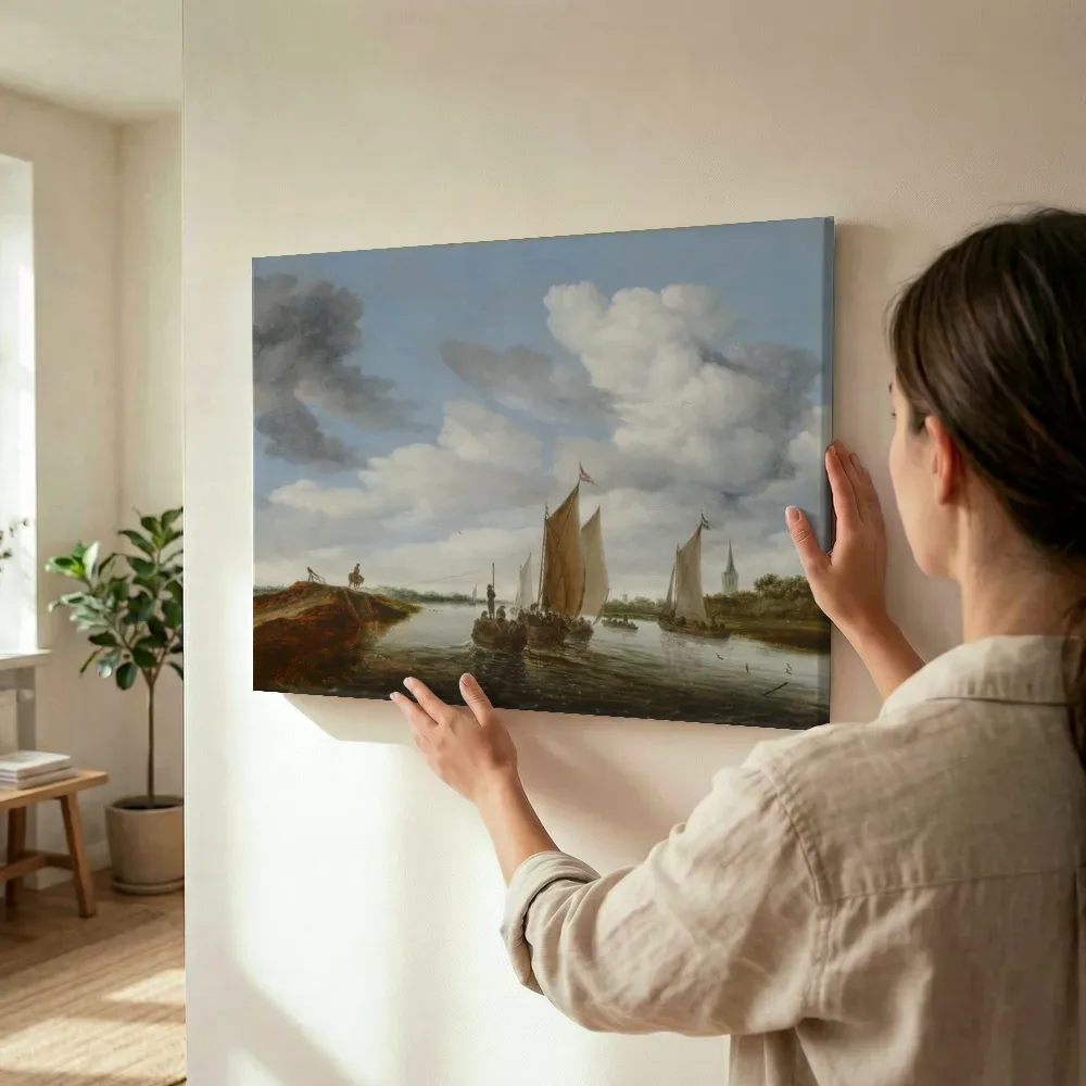 Sfeerimpressie: Rivierlandschap met zeilboten en een trekschuit van Salomon van Ruysdael terwijl het wordt opgehangen
