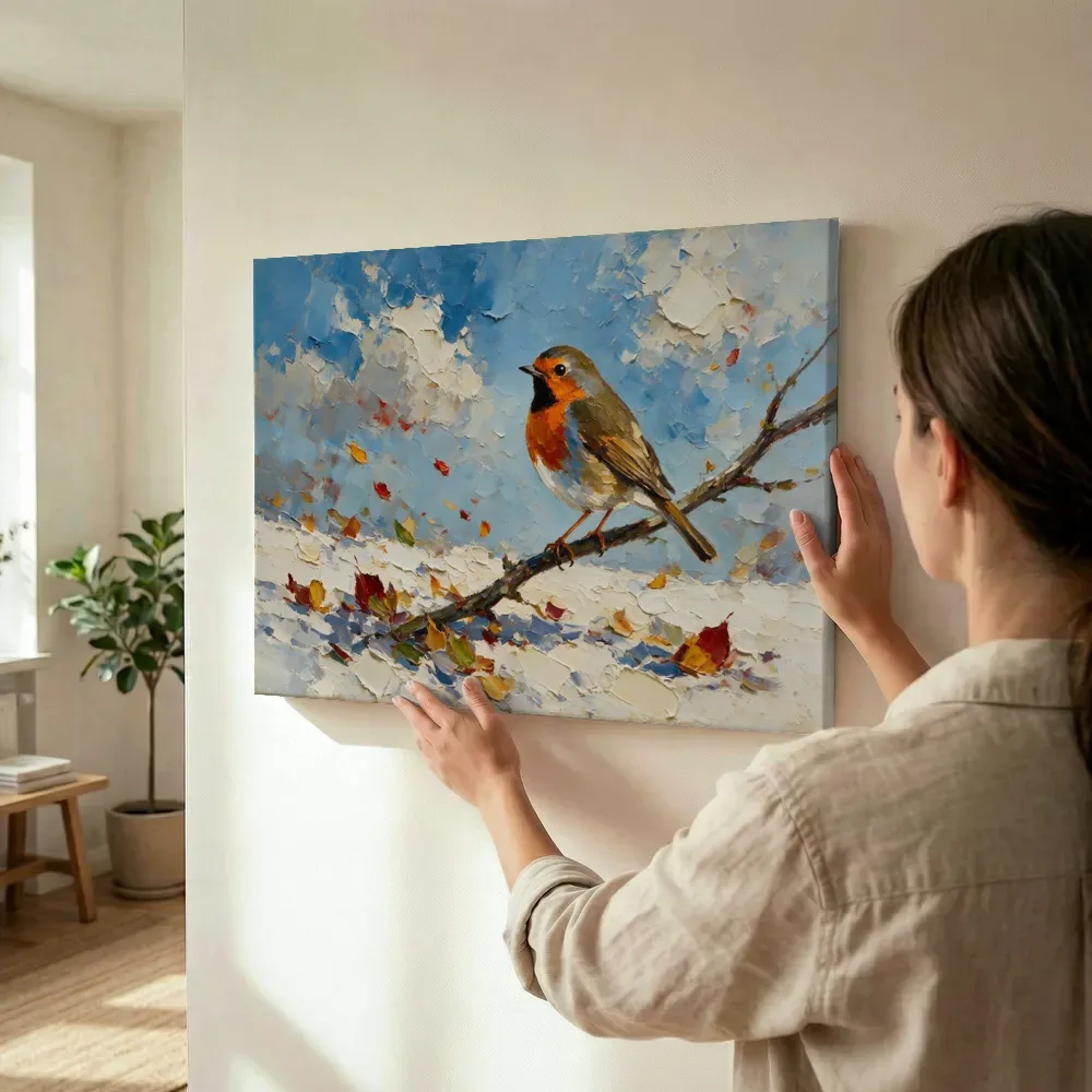 Sfeerimpressie: Roodborst op een tak in oranje terwijl het omhoog wordt gehouden