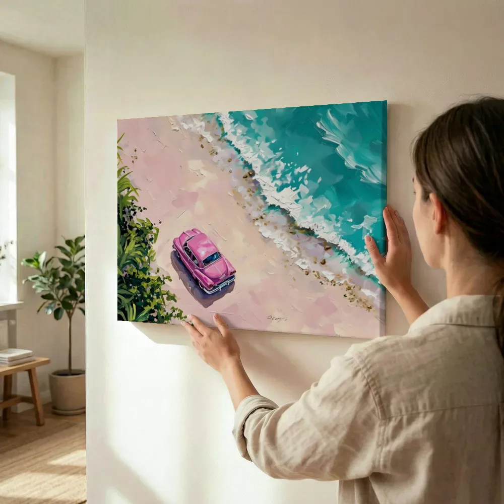 Sfeerimpressie: Roze oldtimer aan zee terwijl het wordt opgehangen