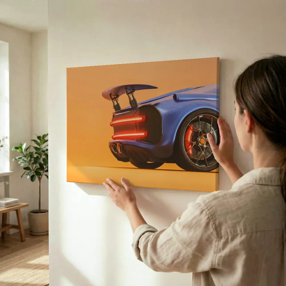 Sfeerimpressie: Sportwagen in warm studiolicht terwijl het wordt opgehangen