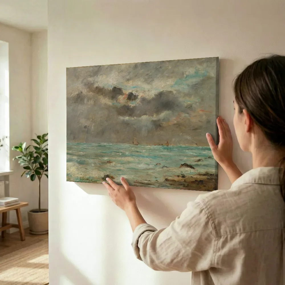 Sfeerimpressie: De kust bij Trouville van Eugene Boudin terwijl het wordt opgehangen