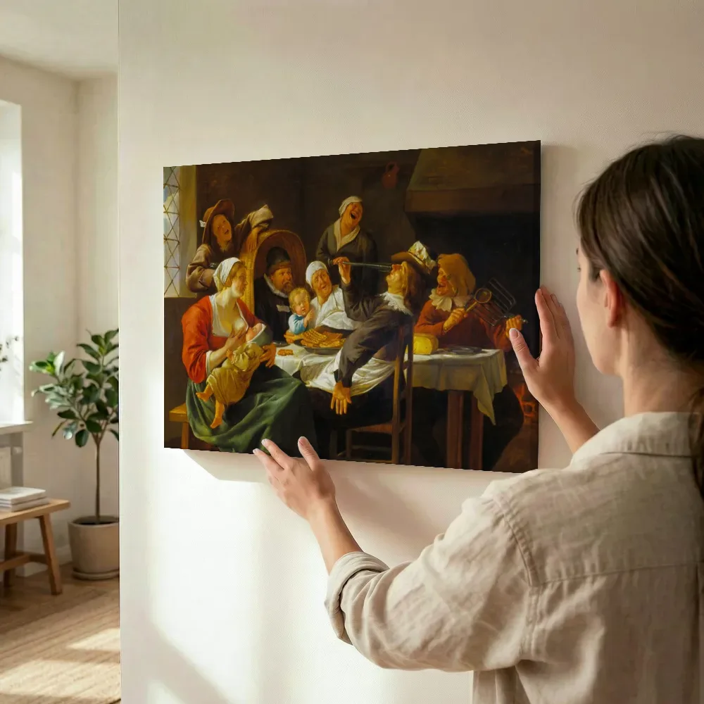Sfeerimpressie: Het driekoningenfeest van Jan Steen terwijl het wordt opgehangen