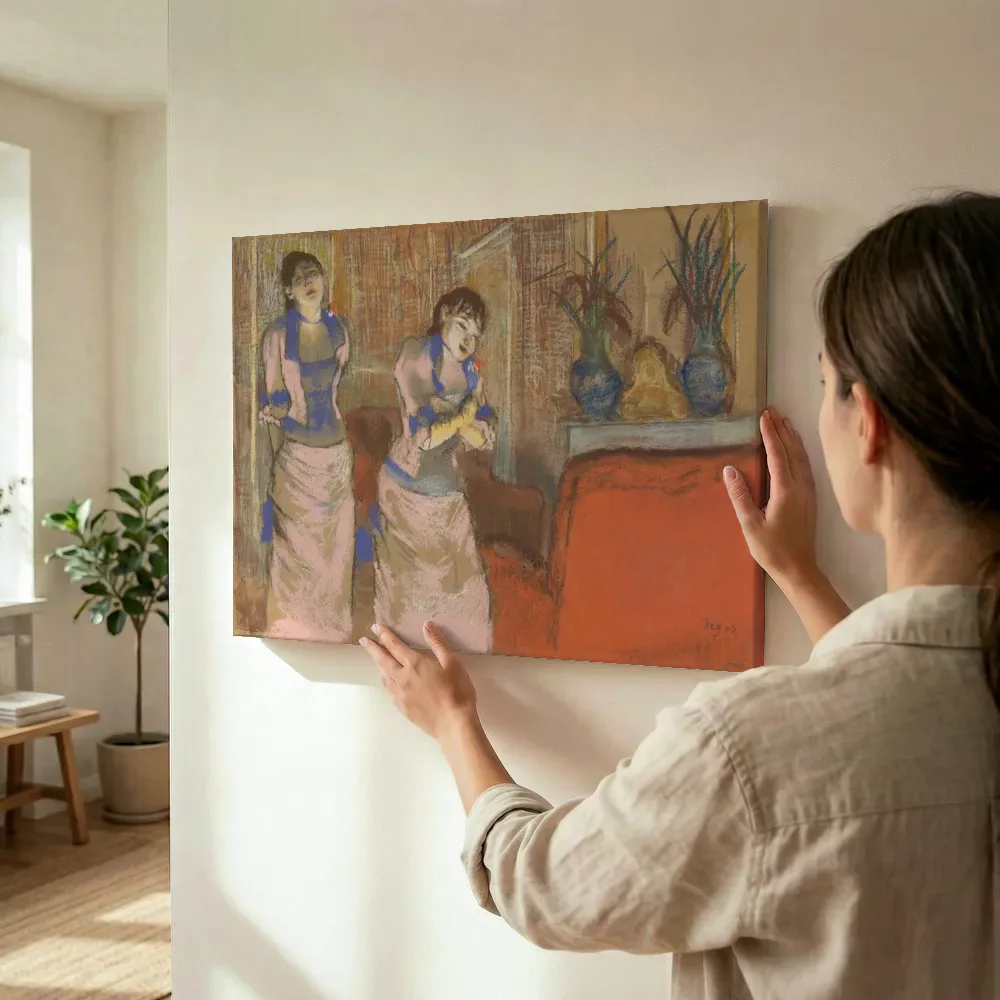 Sfeerimpressie: Twee vrouwen van Edgar Degas terwijl het wordt opgehangen