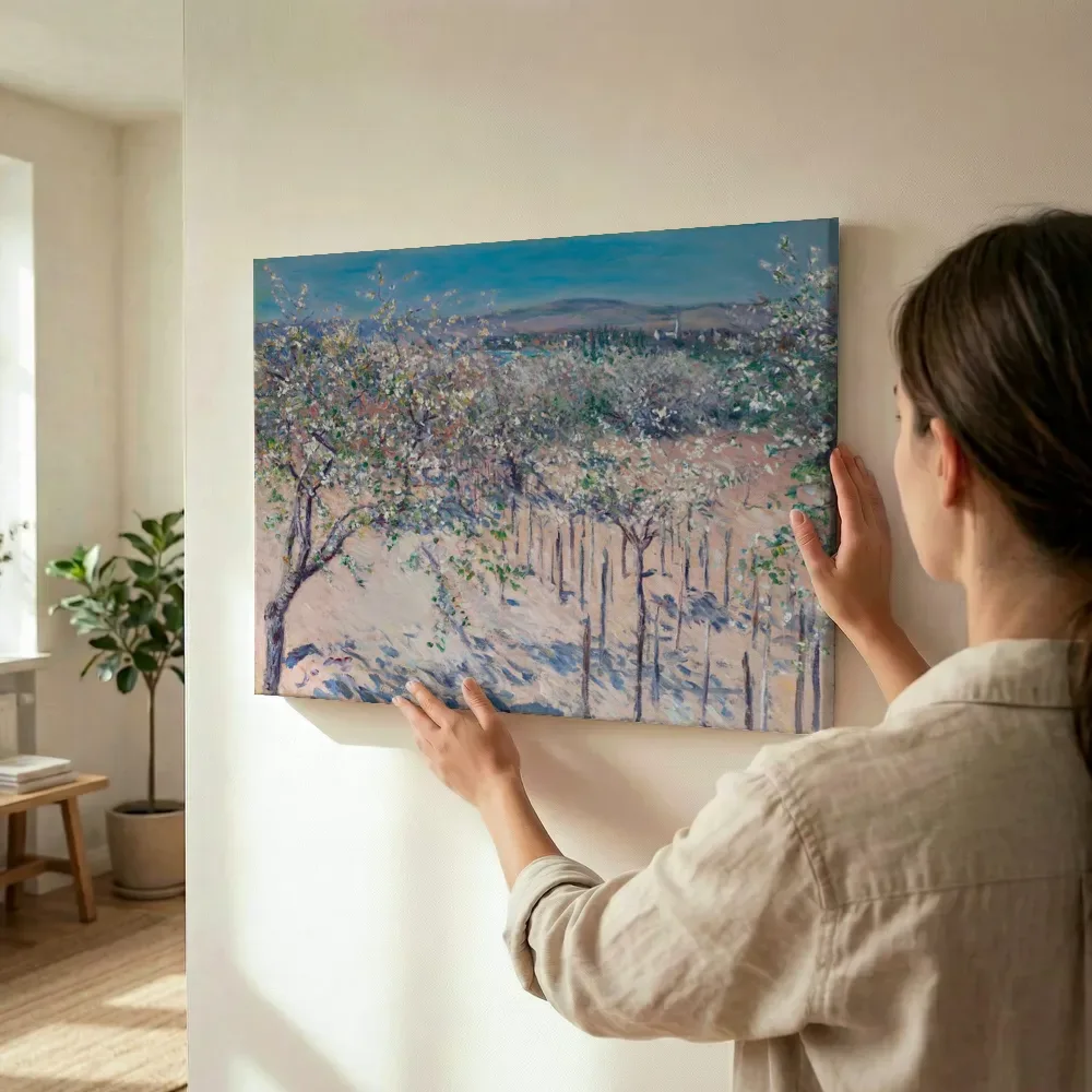 Sfeerimpressie: Verger aux pommiers en fleurs, Colombes van Gustave Caillebotte terwijl het wordt opgehangen