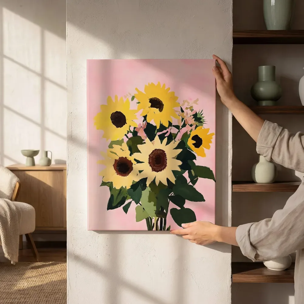 Sfeerimpressie: Zonnebloemen boeket op roze terwijl het aan de muur wordt gehangen