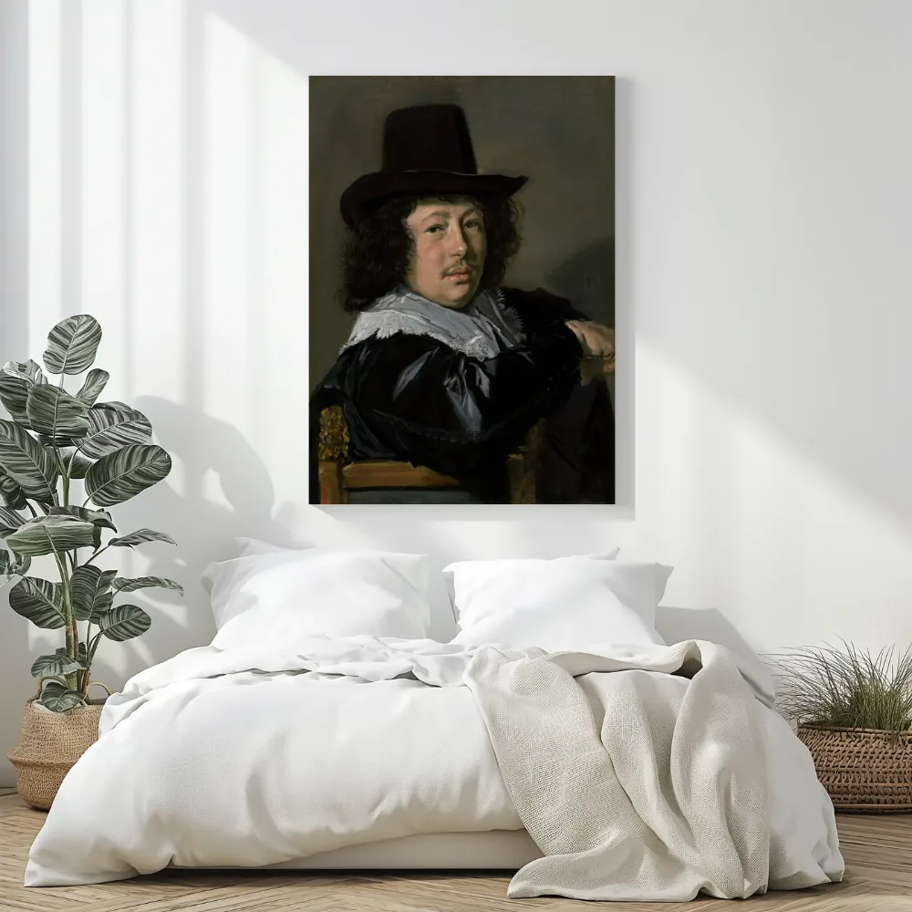 Portret van een zittende jonge man met een zwarte hoed van Frans Hals, canvas schilderij uit de collectie oude meesters